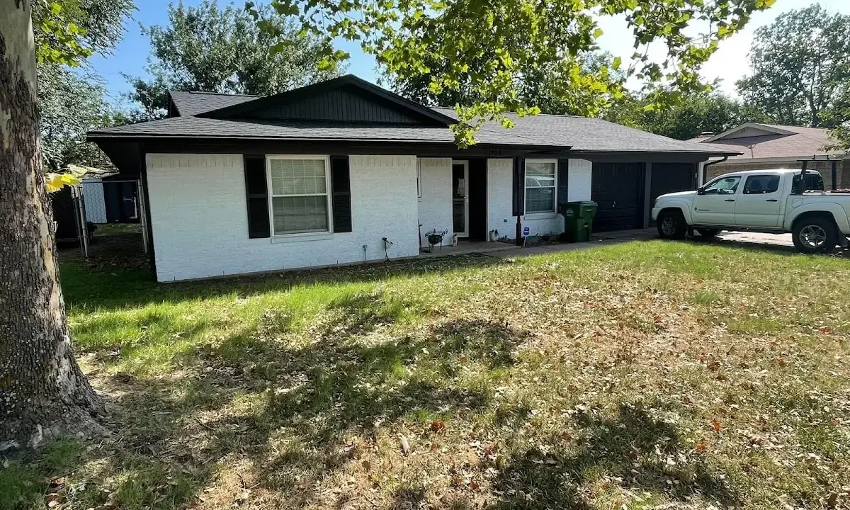 Professional roofing crew working on a residential roof in Birdsboro